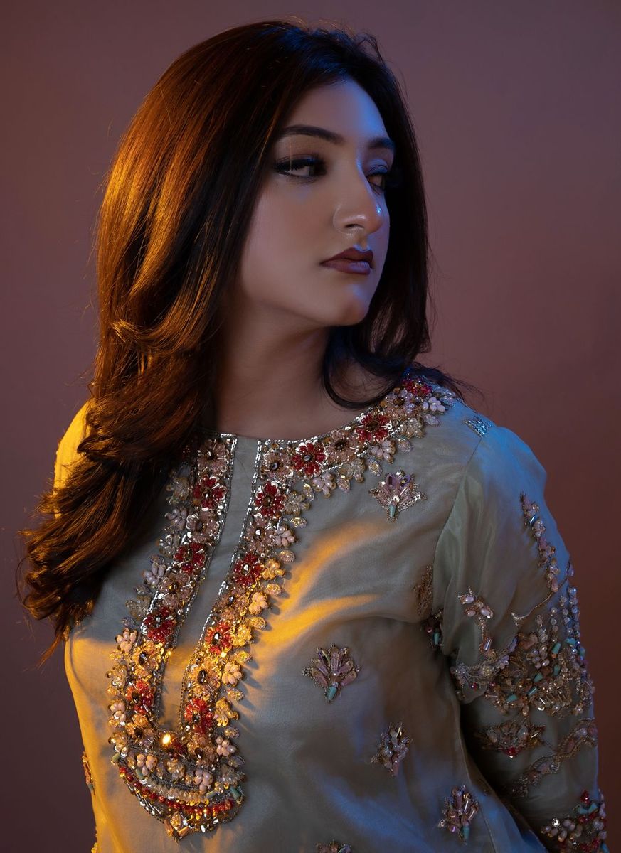 Walima look in sage with a rust dupatta