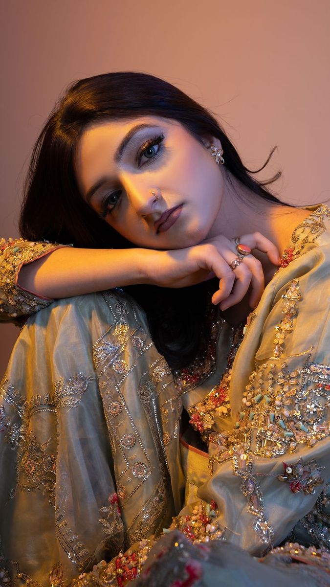 Walima look in sage with a rust dupatta