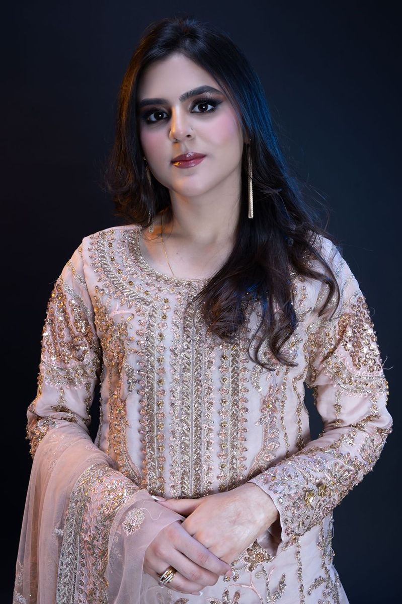 Formal portrait in blush and gold
