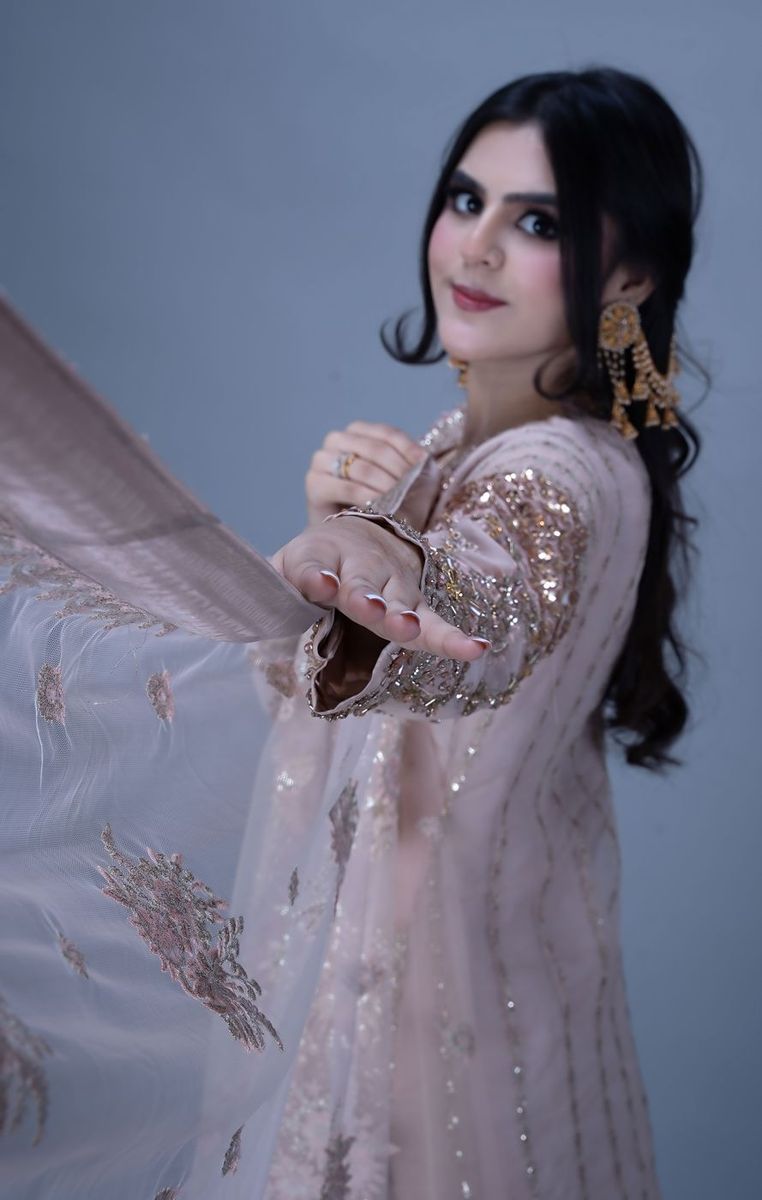 Formal portrait in blush and gold