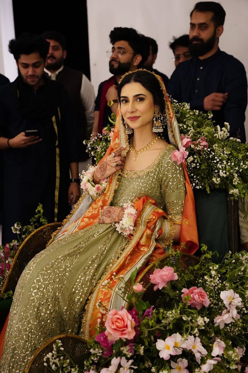 Bride in green at her mayoun