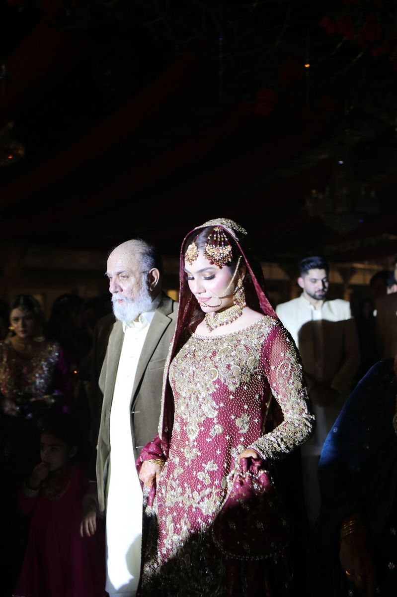 Bride arriving with her father